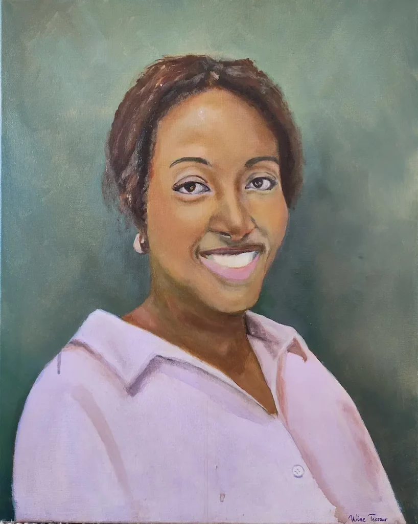 A dark skinned woman in a purple shirt